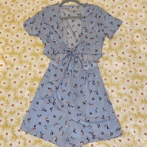Blue floral romper, never been worn in mint condition.